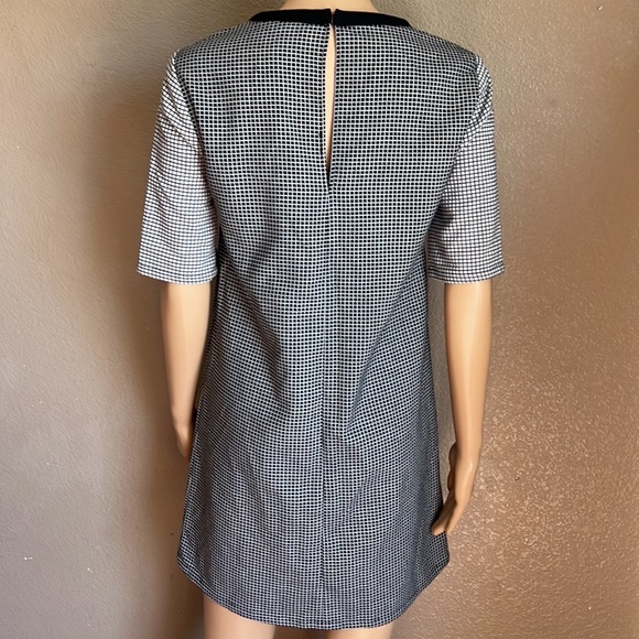 BCBGENERATION Black & White Checkered
Sheath Dress with Sheer V Neck Size XS - Picture 5 of 12